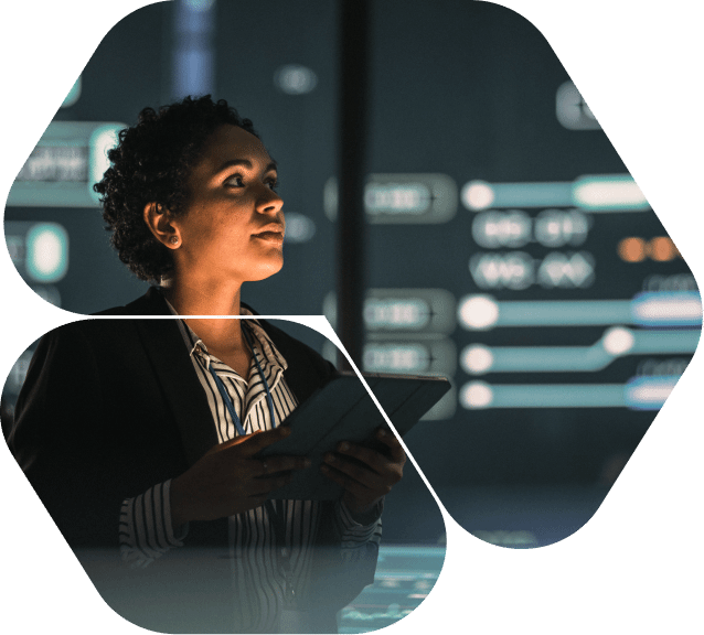 Focused individual engaged in programming or coding