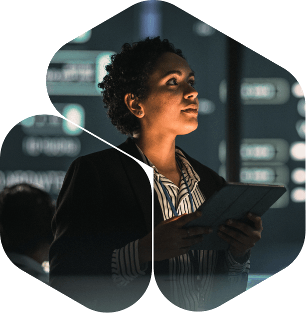 Professional Woman Analyzing Data in a Modern Environment