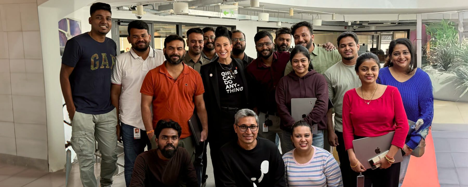 Group Photo of Team Members at an Office Event
