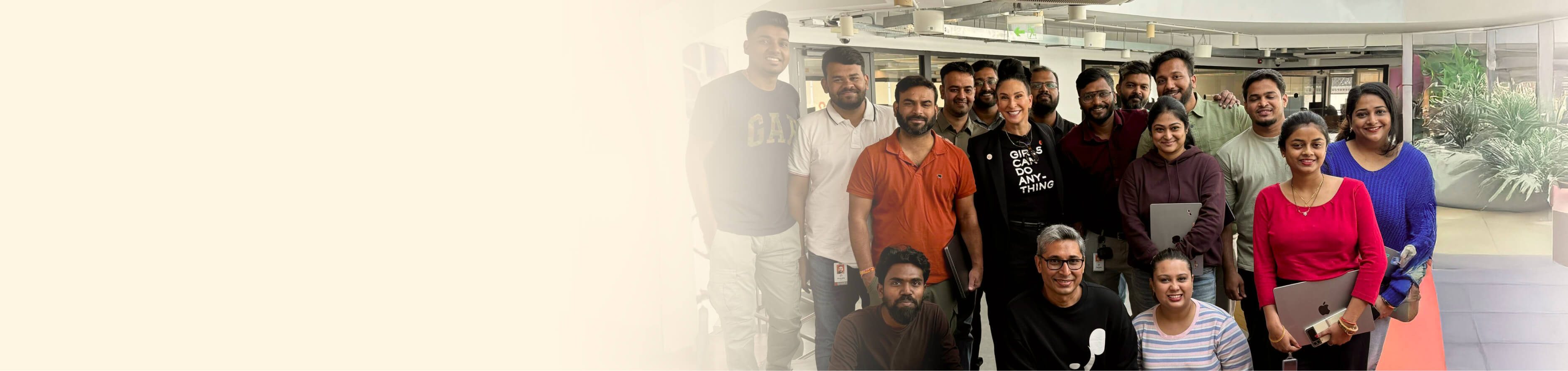 Group photo of a diverse team in a professional setting