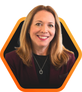 Professional portrait of Pure Storage CMO, Lynn Lucas, against a colorful background