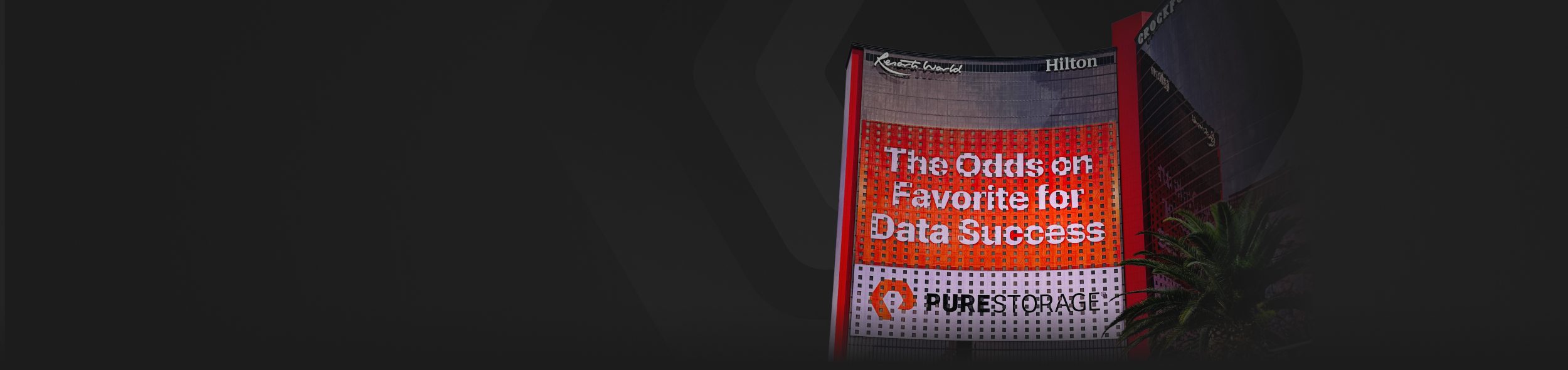 Sleek urban structures with vibrant lighting at night