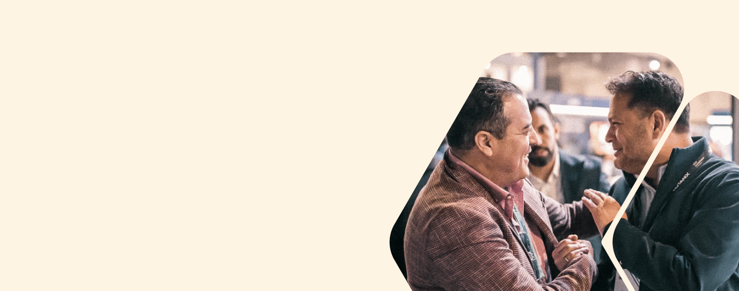 Three men engaged in a lively conversation